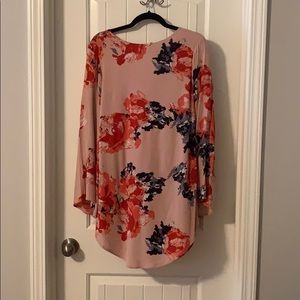 Medium floral dress! Flare sleeves and open back